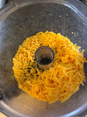 Shredded cheese in a food processor