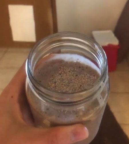 Berry/veggie smoothie topped with chia seeds.