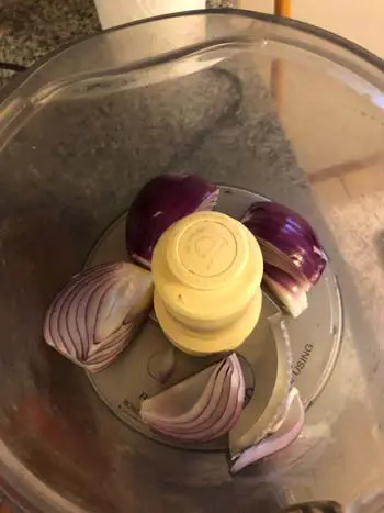 quarted onions in food processor