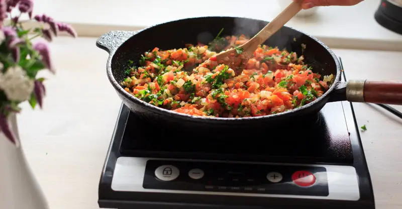 A delicious meal prepared over an induction cooktop