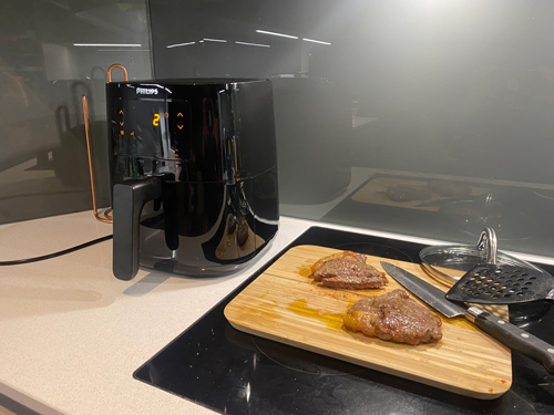 personal image of cooked steak in an air fryer