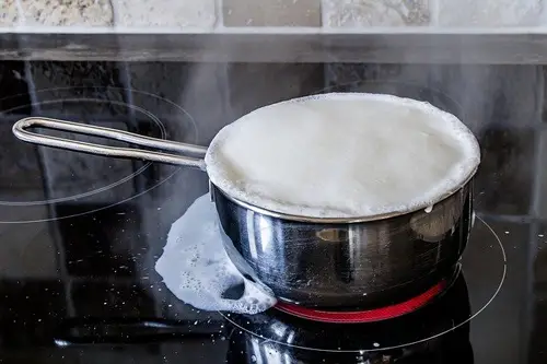 Boiling milk spill on induction cooktop