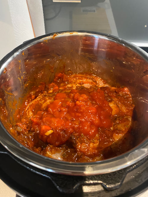 Salsa and chicken finished cooking inside the Instant Pot Duo Mini