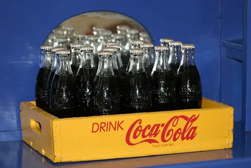 A crate of coke in glass bottles